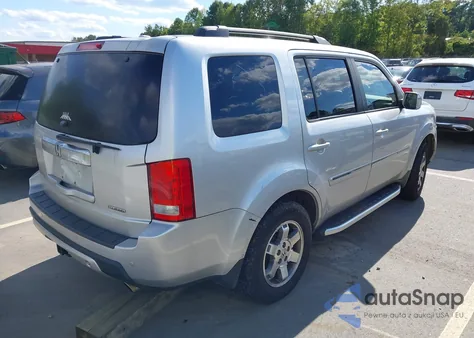 2009 Honda Pilot Touring z USA, uszkodzony, nr VIN 5FNYF38999B006190